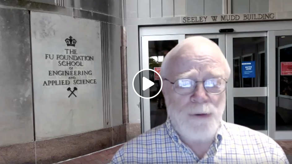 An image taken from an online video of a man with white hair, glasses and a white beard and mustache talking in front of an image of the Columbia School of Engineering